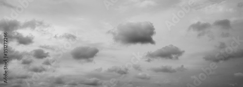 Panorama of a gray sky with clouds. High resolution, no birds, no noise.