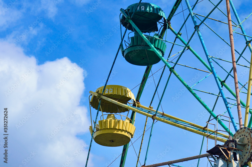 old ferris wheel on sky background