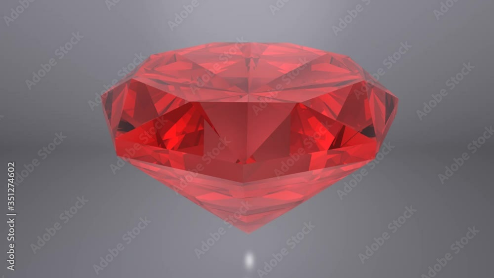 Red Ruby diamond placed on gray background. 3D animation. Red Ruby diamond placed on gray background. 3D animation.