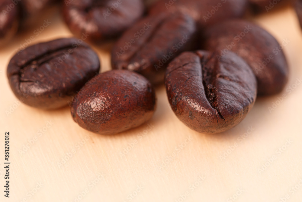 Obraz premium Coffee beans roasted dark with copy space
