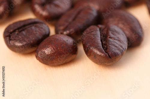 Fototapeta Naklejka Na Ścianę i Meble -  Coffee beans roasted dark with copy space