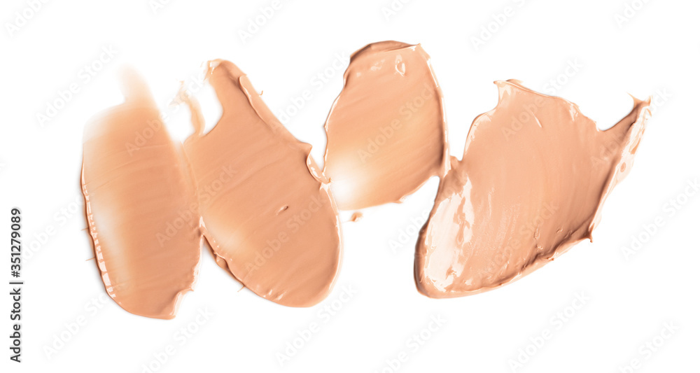 Set of liquid gently beige smears of makeup creamy foundation isolated on white background. Cosmetic concealer. Realistic brown cream texture for makeup. Set of liquid gently beige smears of makeup creamy foundation isolated on white background. Cosmetic concealer. Realistic brown cream texture for makeup.