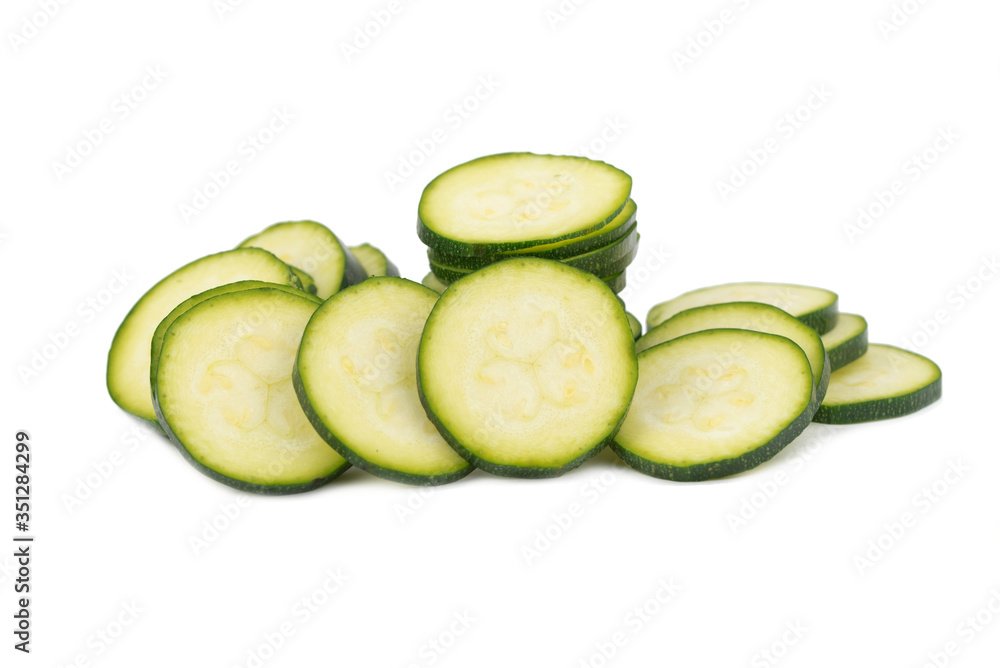 green courgette cut in many slices