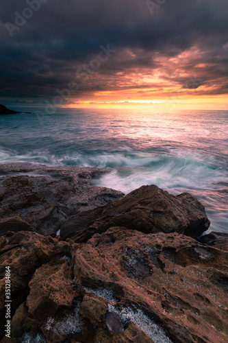 Sunset in the basque coast under Jaizkibel mountain in Hondarribia, Basque Country.