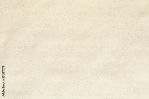 Old brown grainy paper background texture 