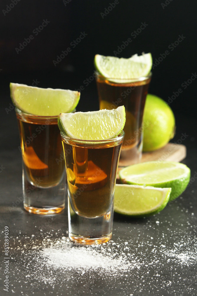Shots with tequila with salt and lime Shots with tequila with salt and lime