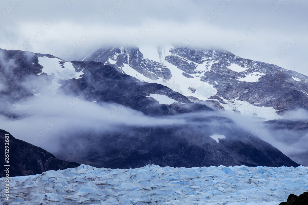 Foggy and Snowy View to the Clear and Blue Ice in the Glacier Gray, Chile