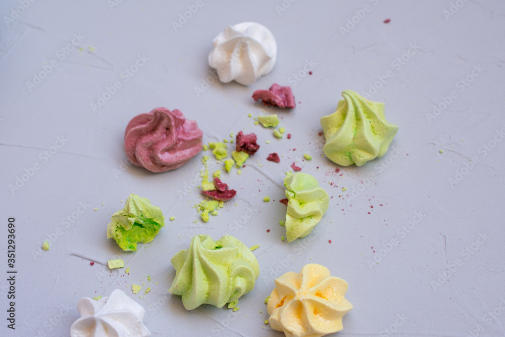 colored meringue sweets, marshmallows, cake colored meringue sweets, marshmallows, cake