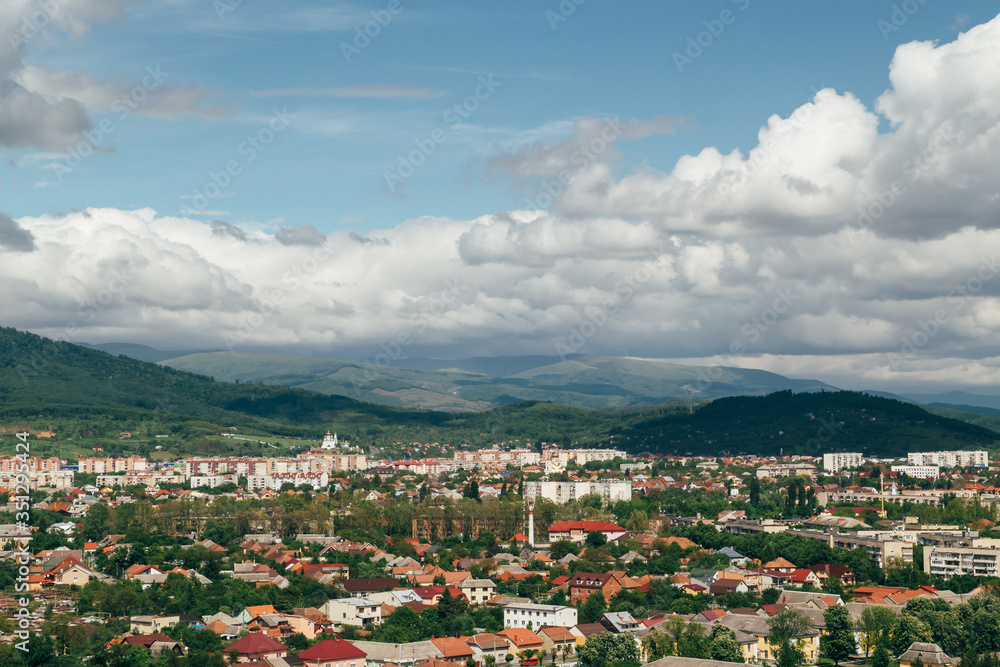 Beautiful panoramic view of Mukachevo, Ukraine from the top of The Palanok Castle or Mukachevo Castle at bright sunny day