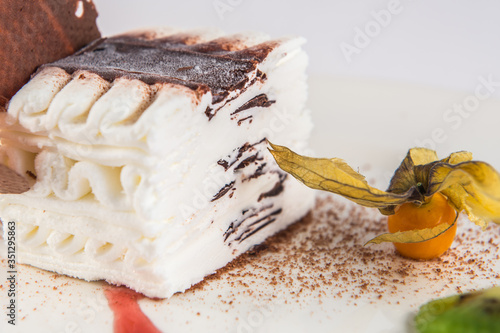 Viennetta frozen cake dessert with a Physalis.