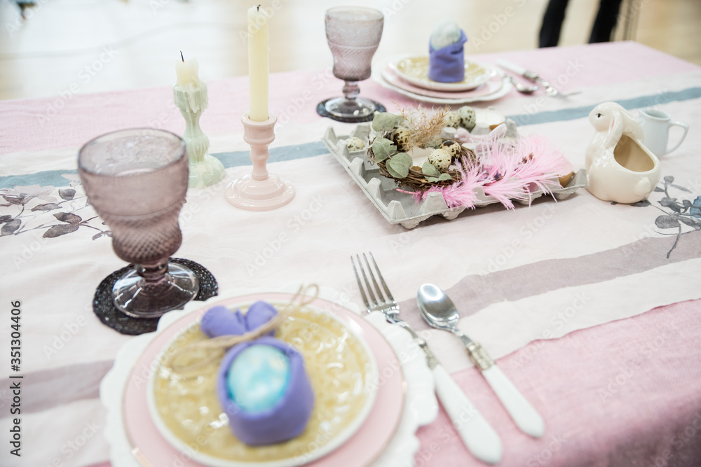 Beautiful festive Easter table setting with napkin