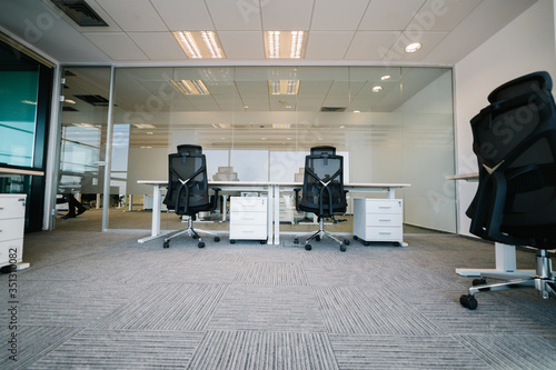 Two chairs in an empty office