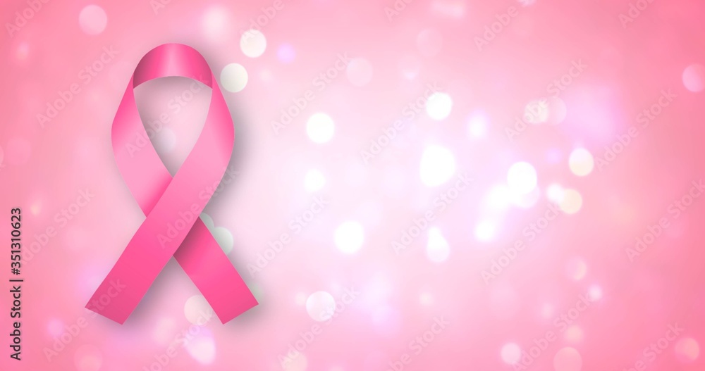 Pink Ribbon with a white lights on a pink background. Breast cancer concept. Pink Ribbon with a white lights on a pink background. Breast cancer concept.