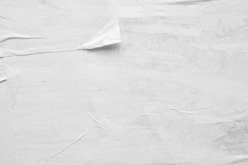 Blank white crumpled and creased paper poster texture background