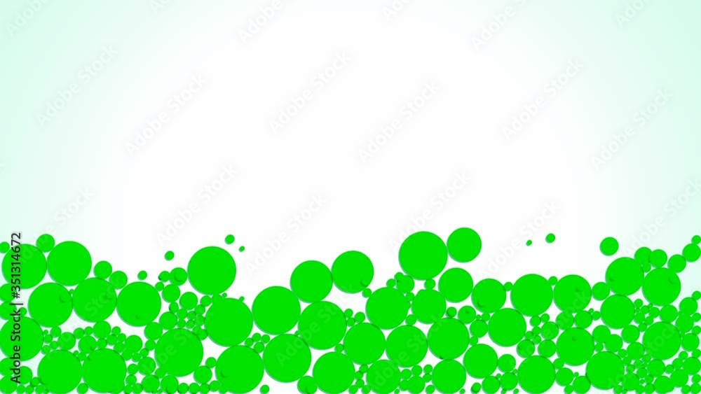 falling green circles on a green background falling green circles on a green background