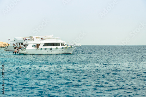Rest on the white yacht (ship) in the Bay of Sharm El Sheikh. Photo on a sunny day..Holidays in 2018.