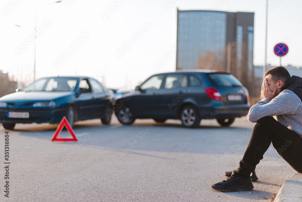 Nervous man after car crashing Nervous man after car crashing