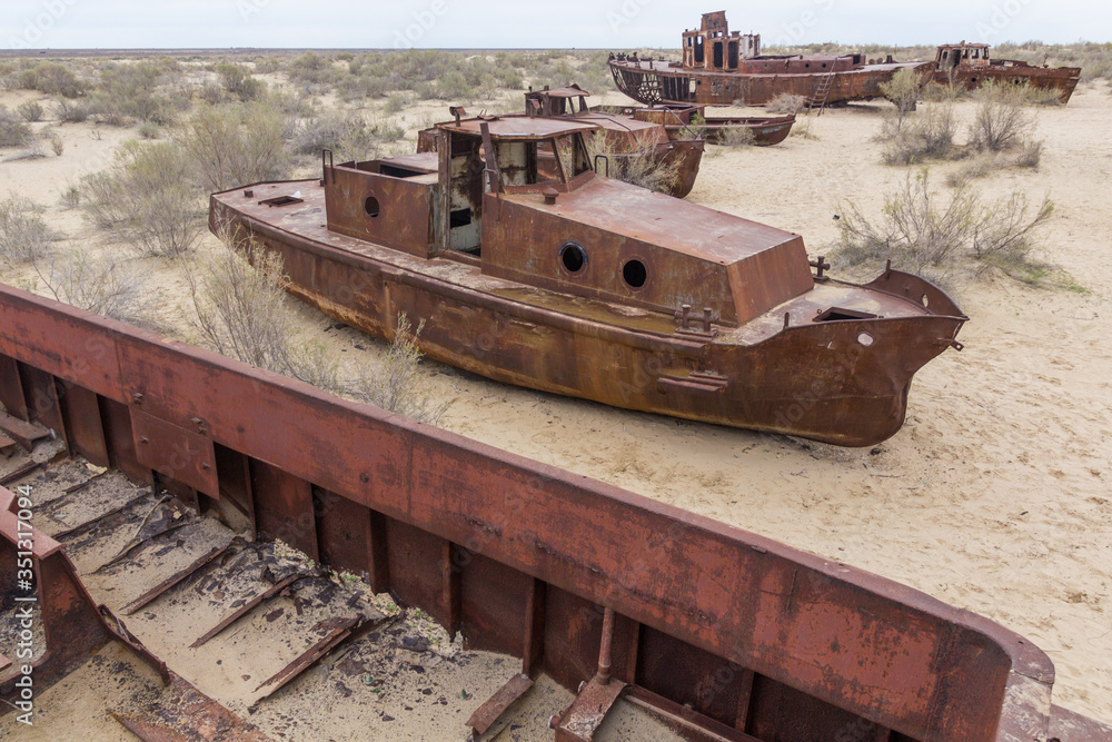 Rusty ships at the ship graveyard in former Aral sea port town Moynaq (Mo‘ynoq or Muynak), Uzbekistan