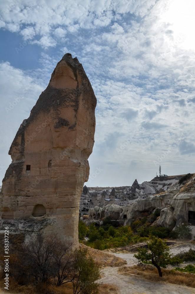Beautiful mountain landscape with cave houses in Cappadocia valley near Goreme, Turkey