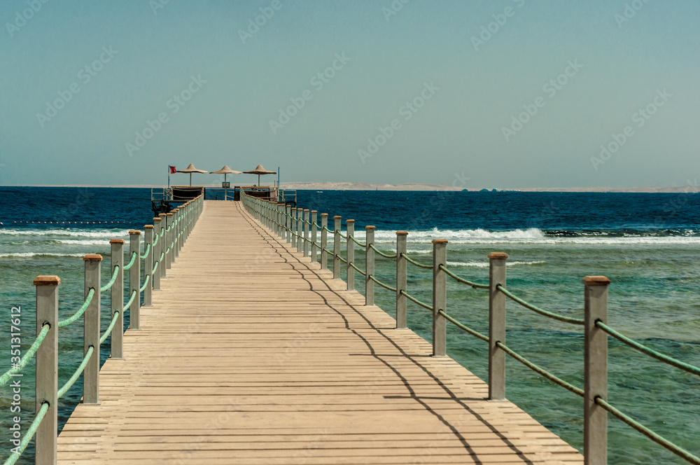 Pier at the hotel .Sharm El Sheikh. Photo on a sunny day. Mountains and the sea..Holidays in 2018.