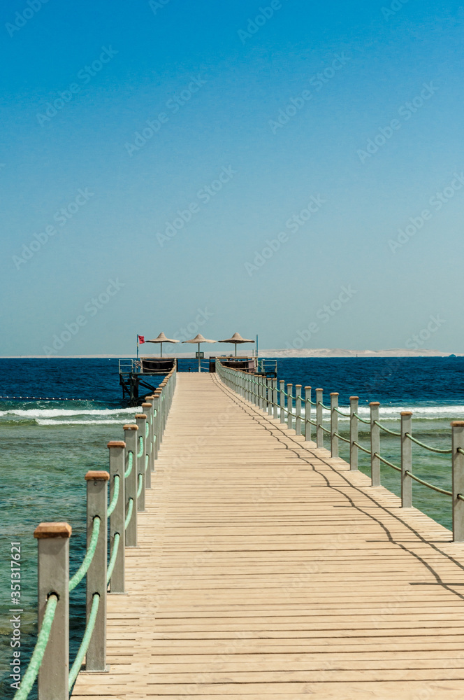 Pier at the hotel .Sharm El Sheikh. Photo on a sunny day. Mountains and the sea..Holidays in 2018.