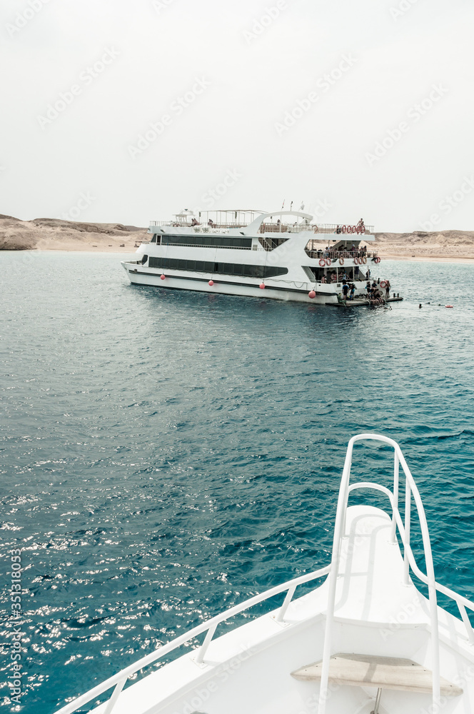 Rest on the white yacht (ship) in the Bay of Sharm El Sheikh. Photo on a sunny day..Holidays in 2018.