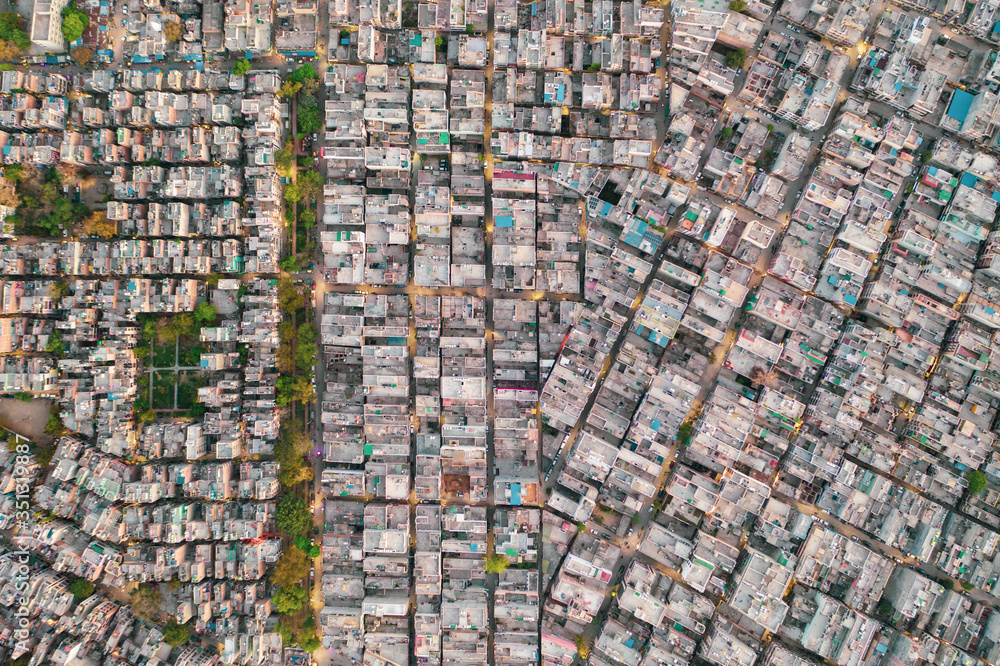 Aerial view of roofs of houses and buildings on sunny day in Delhi, India Aerial view of roofs of houses and buildings on sunny day in Delhi, India