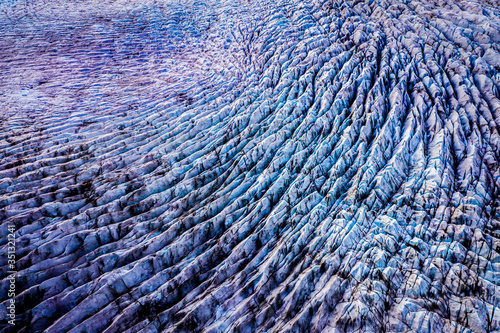 Aerial view of the glacier Fjallsjokull, at the glacier lagoon Fjalls·rlÛn, south coast of the Iceland. Shot was taken few moment after the sunset. photo