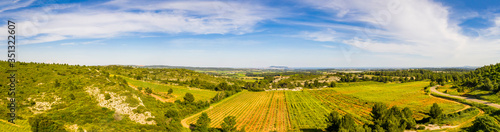 Panorama of the countryside behind Valemagne and the port of Sète in the distance in the Hérault in Occitania, France