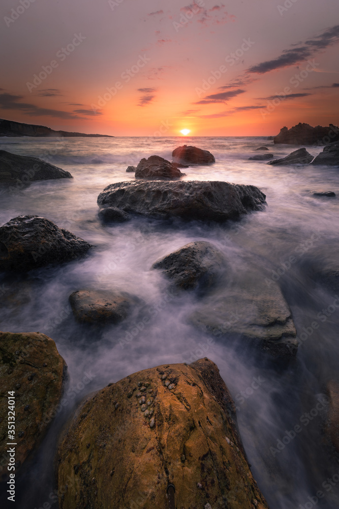 Obraz premium Sunset in the basque coast under Jaizkibel mountain in Hondarribia, Basque Country.
