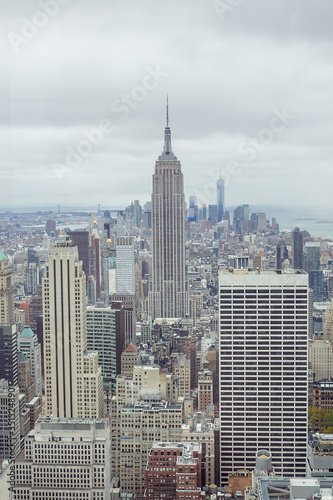 Panoramic view of Manhattan in the clouds from a skyscraper height © Ilya