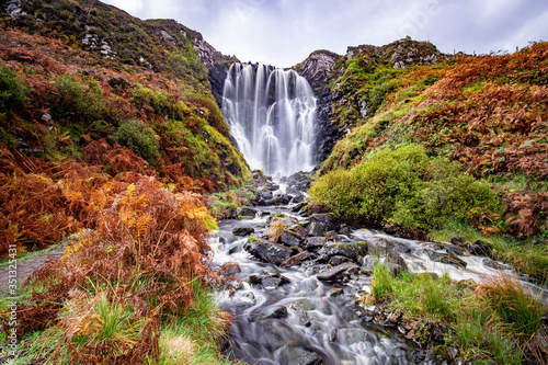 Clashnessie Falls in the dramatic highlands of scenic Scotland, a fantastic adventure travel destination for a holiday vacation to view awesome picturesque scenery