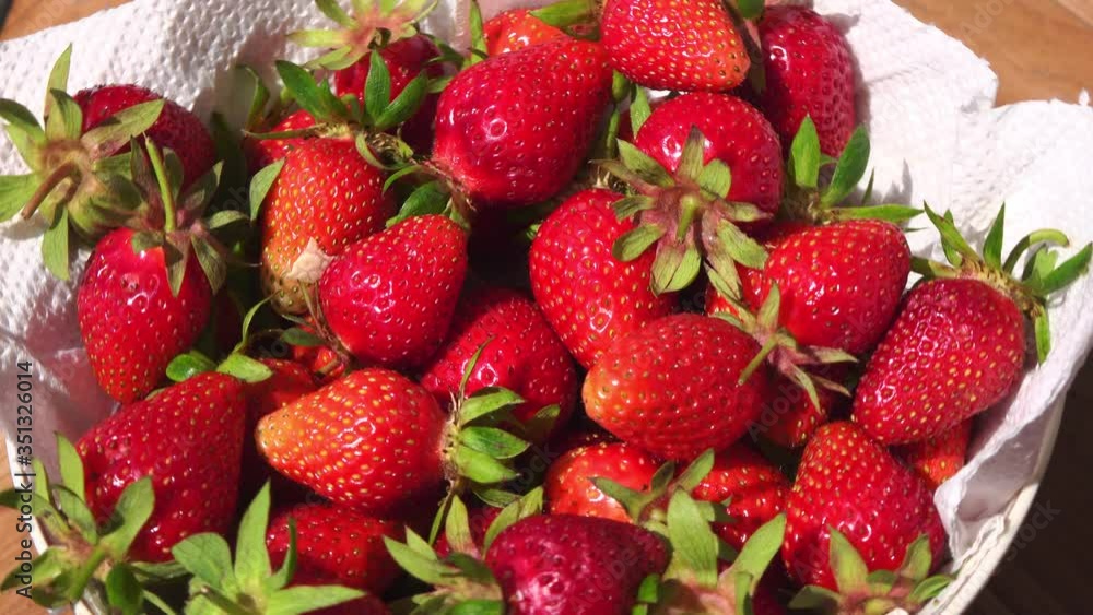 Strawberry on a rotating background Strawberry on a rotating background
