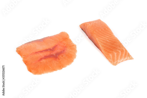 sliced red fish with lemon on white background