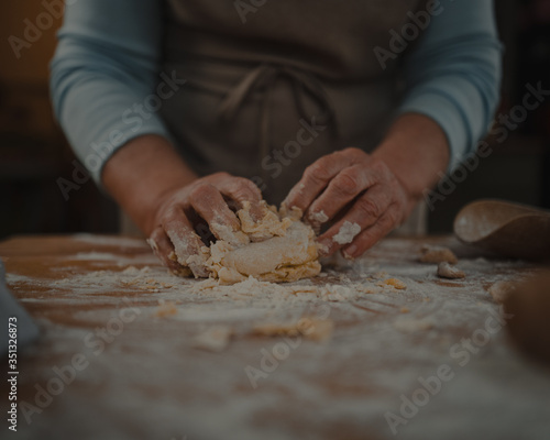 grandmother prepares fresh homemade pasta