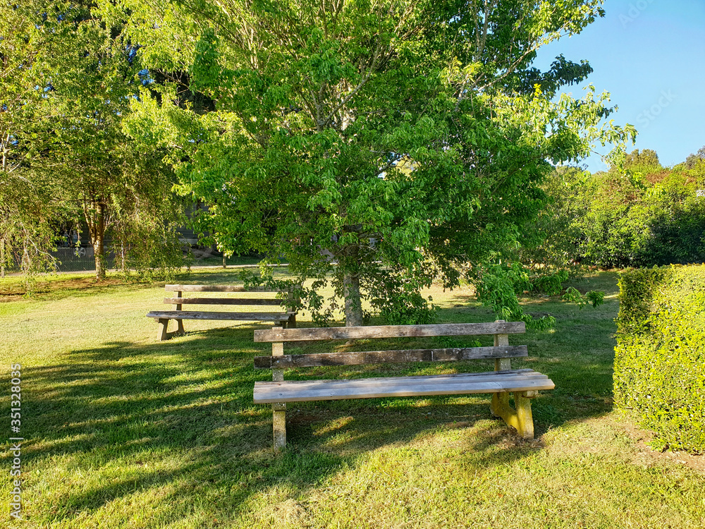 Fototapeta premium bench in the park, outside photography
