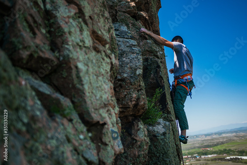 Rock climbing on a sunny summer day