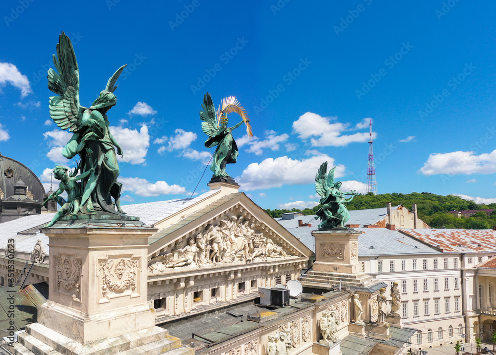 Fototapeta premium Sculptures on Lviv opera house, Ukraine from drone