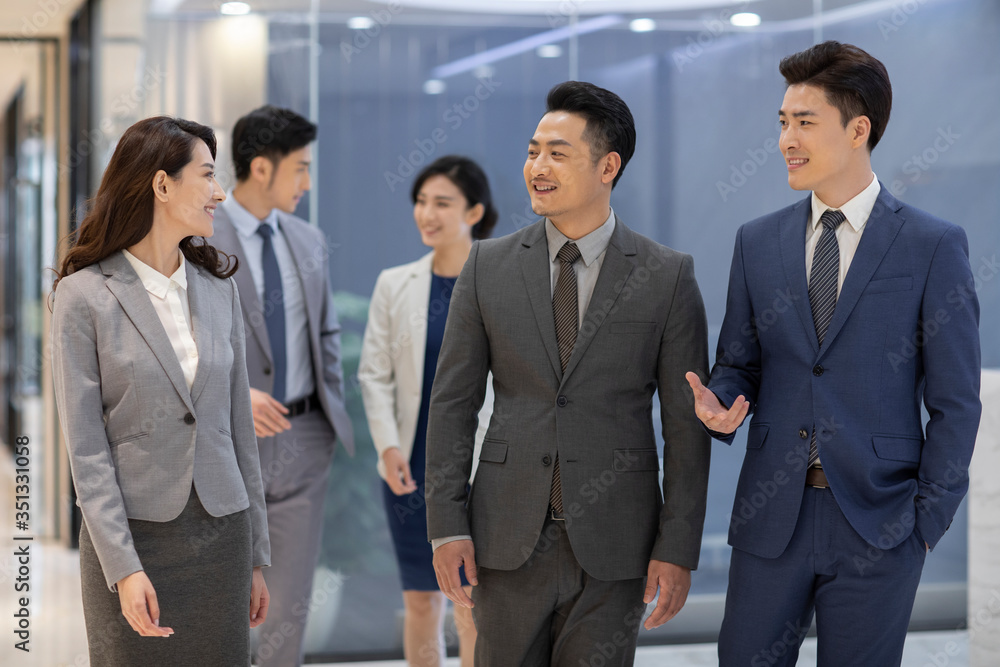 Successful business people talking in office Successful business people talking in office