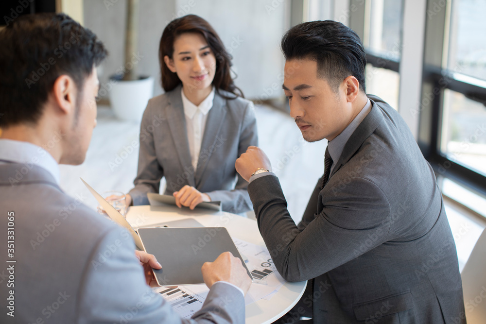 Successful business people talking in office Successful business people talking in office