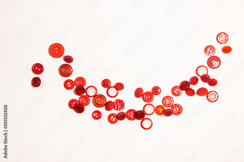 Red buttons on a white background Red buttons on a white background
