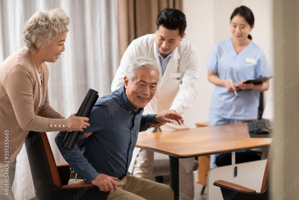 Senior patient and doctor in doctor's office Senior patient and doctor in doctor's office