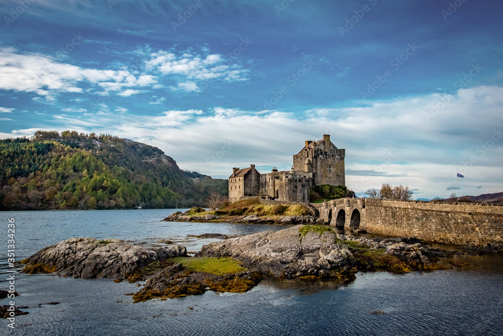 Eilean Donan Castle, in the dramatic highlands of scenic Scotland, a fantastic adventure travel destination for a holiday vacation to view awesome picturesque scenery