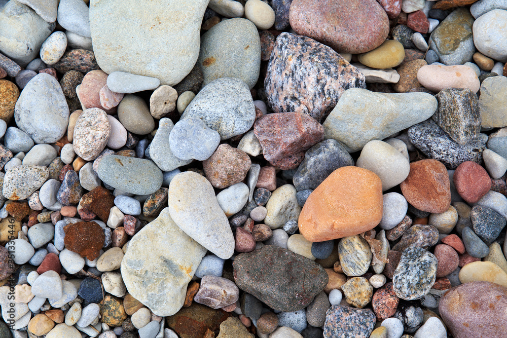 Pile of different smooth stones on the seashore. Pile of different smooth stones on the seashore.