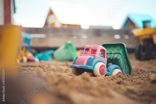 Wallpaper Mural Childhood sandbox concept: Close up of plastic toy truck Torontodigital.ca