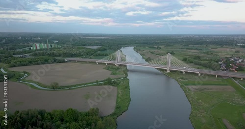 Bridge of Cardinal Franciszek Macharski in Krakow at sunset. photo