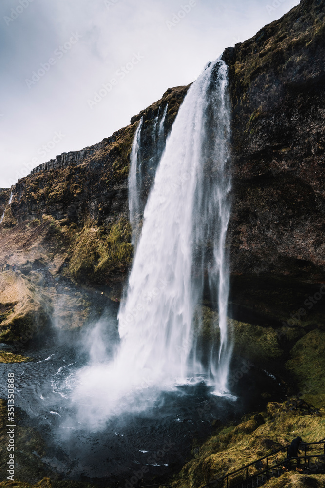 Iceland,?Seljalandsfoss?waterfall splashing down cliff Iceland,?Seljalandsfoss?waterfall splashing down cliff