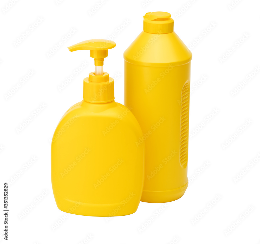 Two Yellow bottles with dishwashing liquid isolated on a white background Two Yellow bottles with dishwashing liquid isolated on a white background
