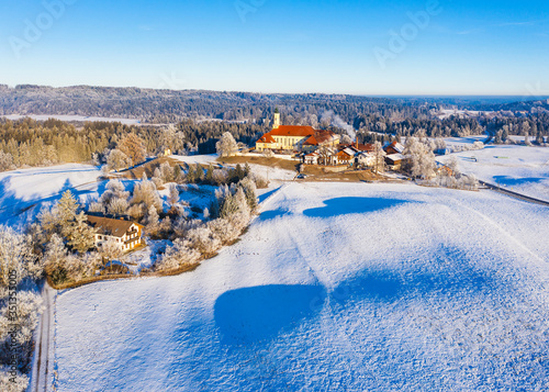 Germany, Bavaria, Sachsenkam, Drone view of Kloster Reutberg in winter