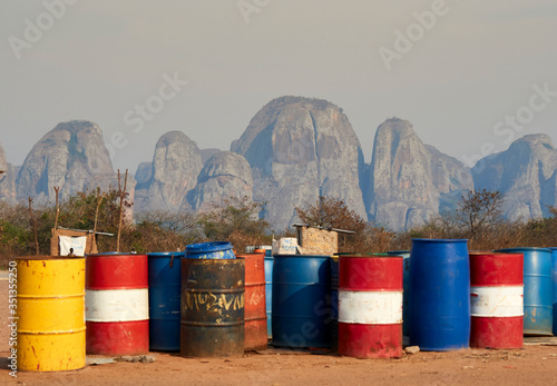 View to Pedras Negras mountains with gas tanks in the foreground, Pungo Andongo, Angola photo